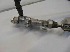 Caliper Bridge Assembly